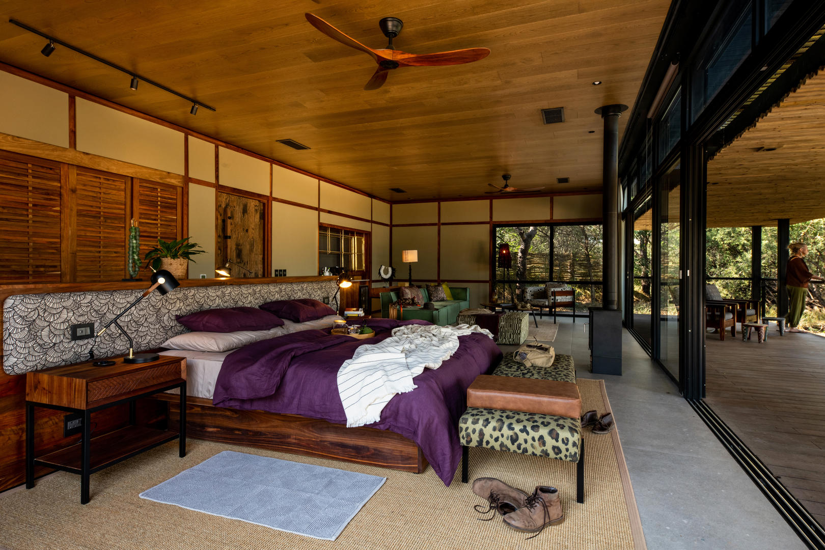 tanda tula safari camp interior bedroom and patio1
